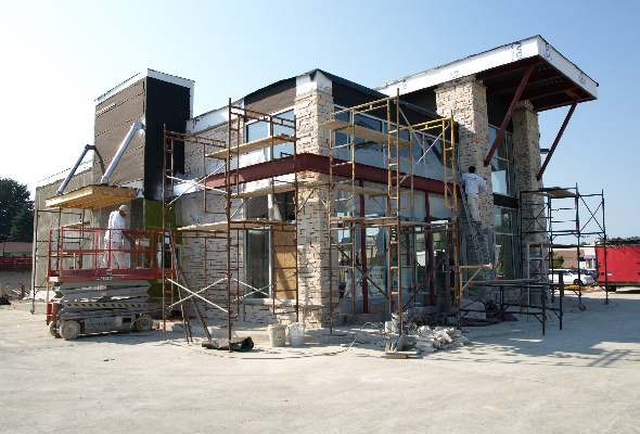 An exterior of a local bank under construction. Commercial industrial painting